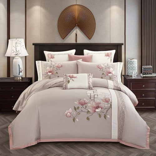 Chinese national style bedding with floral embroidery and long staple cotton fabric.