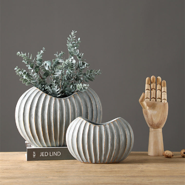 Nordic White Ceramic Vase DecorationProduct information:
 
 Material: Resin
 
 Size: large and small
 
 Style: Light Luxury Style
 
 Color classification: Large (30.5 * 12.5 * 20.5CM) Small (23 * 10 * 0nullLofineNordic White Ceramic